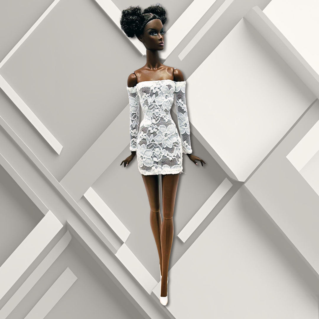 12" African- American supermodel fashion doll wearing a white lace sheath mini dress.