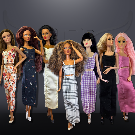Set of dolls with diverse hairstyles and outfits on a dark background